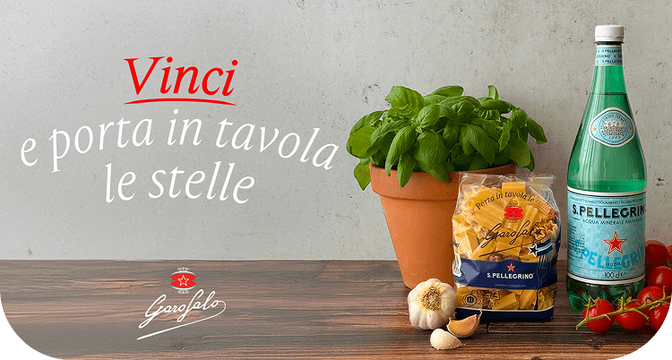 Una pianta di basilico, pasta Garofalo e una bottiglia San Pellegrino. In basso su una banda rossa il testo:'Vinci e porta in tavola le stelle'