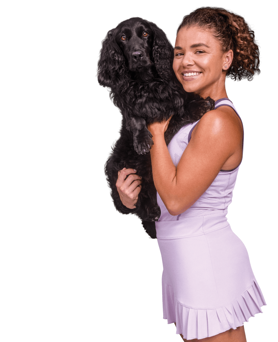 Jasmine Paolini con un cane