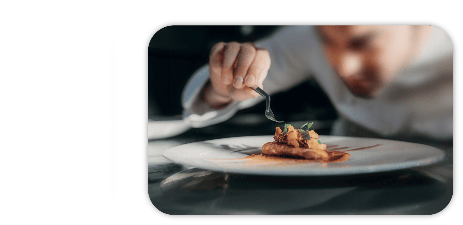 testo:'The world's 50 best restaurants 2025' e immagine di chef che sistema un piatto gourmet
